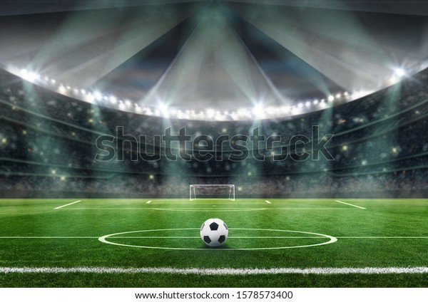 soccer stadium\
in the evening - ball in\
midfield