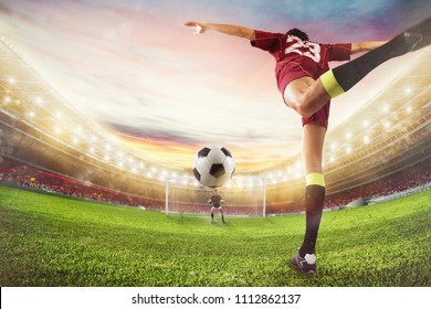 Soccer striker hits the ball with an acrobatic kick. 3D Rendering