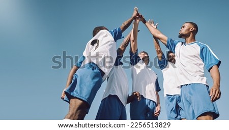 Soccer, team high five and men celebrate winning at sports competition or game with teamwork on field. Football champion group with motivation hands for a goal, performance and fitness achievement