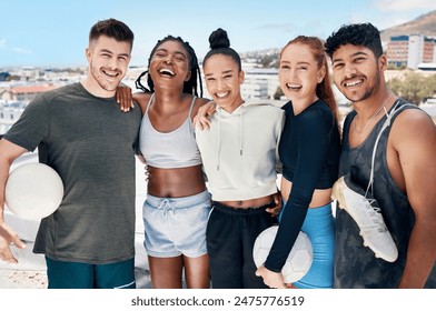 Soccer team, sports diversity or fitness friends on city building rooftop in training game, exercise match or workout. Portrait, happy smile or football players, men or women and teamwork soccer ball - Powered by Shutterstock