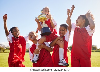 Soccer, team and trophy with children in celebration together as a girl winner group for a sports competition. Football, teamwork and award with soccer player kids celebrating success in sport - Powered by Shutterstock