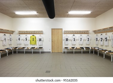 Soccer teams dressing room with numbered shirts - Powered by Shutterstock