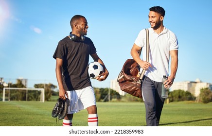 Soccer, training and friends walking on field after practice, match and football game. Diversity, fitness and men happy after exercise, workout and playing sports together carrying gear, ball and bag - Powered by Shutterstock