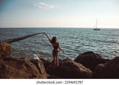 Sochi, Krasnodarskii Krai, Russia - 08.05.2022: Elegant Woman On The Beach