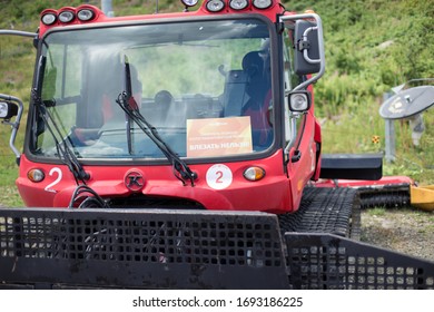 Sochi, Rosa Khutor/Russia - 08 05 2019: Red Snowplow. You Can Watch It! You Can Take Photos! You Can't Get In!