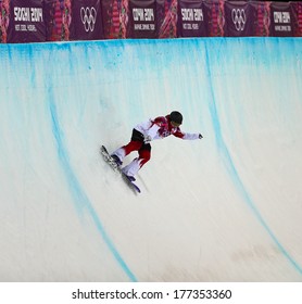 Sochi, RUSSIA - February 12, 2014: Katie TSUYUKI (CAN) At Snowboard Competition During Ladies' Halfpipe Qualification At Sochi 2014 XXII Olympic Winter Games