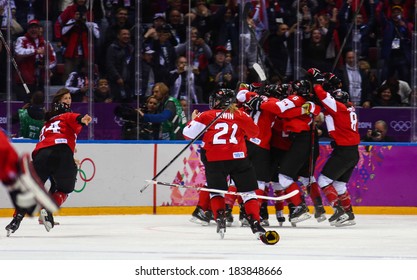 Sochi, RUSSIA - February 20, 2014: Canadian Women's Ice Hockey Team Celebrating Gold Medals, After Gold Medal Game Vs. USA Team At The Sochi 2014 Olympic Games