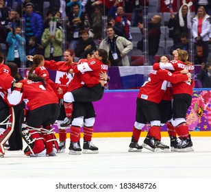 Sochi, RUSSIA - February 20, 2014: Canadian Women's Ice Hockey Team Celebrating Gold Medals, After Gold Medal Game Vs. USA Team At The Sochi 2014 Olympic Games