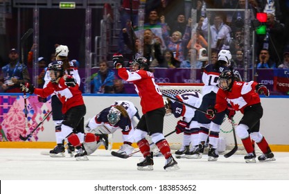 Sochi, RUSSIA - February 20, 2014: Canadian Women's Ice Hockey Team Celebrating Gold Medals, After Gold Medal Game Vs. USA Team At The Sochi 2014 Olympic Games