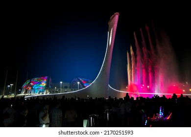 Sochi. Russia . June 3, 2022.Evening show of singing fountains in the Olympic Park Sochi. Olympic flame bowl fountain.