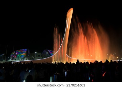 Sochi. Russia . June 3, 2022.Evening show of singing fountains in the Olympic Park Sochi.  Olympic flame bowl fountain.