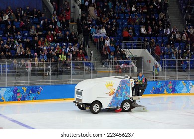 SOCHI, RUSSIA - MAR 12, 2014: Paralympic Winter Games. Shayba Arena, Ice Sledge Hockey Italy-Sweden. Resurfacer Prepares The Ice