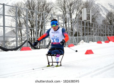 SOCHI, RUSSIA - March 9, 2014: Irek Zaripov (Russia) Competes On Winter Paralympic Games  In Sochi. Biathlon, Men's 15 Km, Sitting