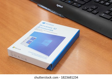 Sochi, Russia - September 28 2020: Microsoft Windows 10 Retail Box With Installation Flash Disc Near Personal Computer Keyboard