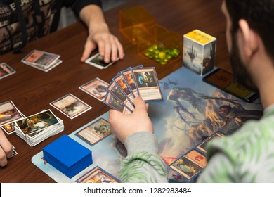 SOCHI, RUSSIA-JANUARY 12, 2019: A Man Is Playing In Board Game Magic: The Gathering