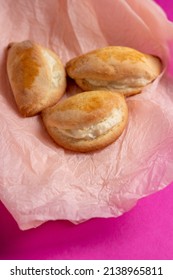 Sochniki, Sochni, With Cottage Cheese. Cookies Stuffed With Cottage Chees On A Pink Background. Copy Space. 