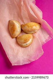 Sochniki, Sochni, With Cottage Cheese. Cookies Stuffed With Cottage Chees On A Pink Background. Copy Space. 