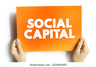Social Capital - networks of relationships among people who live and work in a particular society, enabling that society to function effectively, text concept on card - Shutterstock ID 2224692493