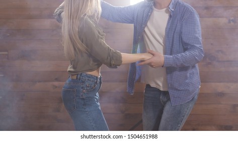 Social Dance, Bachata, Tango Concept - Close-up Of Man Hugs Woman While Dancing