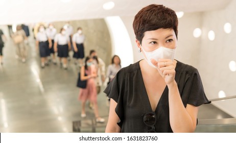 Social Distancing, Beautiful Short Hair Asian Woman Cover Mouth And Cough, Wear Medical Face Mask To Protect From Infection Of Virus, Covid 19 Pandemic, Outbreak, Stop Asian Hate, Anti-asian Racism.