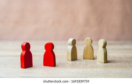 Social distancing during the Corona virus outbreak, red wooden Figure were infected Exclude from people who are not infected to prevent increased outbreaks in Social distancing or infectious concept - Shutterstock ID 1691839759