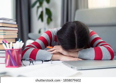 Social Distancing Student Concept, Education At Home. High School Girl Doing Homework At Home With Laptop. Teen Study Home The School Is Closed During Coronavirus Covid-19.