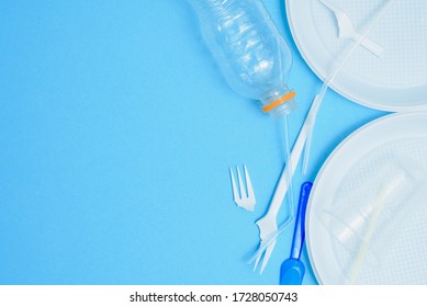 Social Environmental Issue. Plastic Pollution Of The Planet. White Plastic On A Blue Background. Ecological Catastrophy. Sorting And Processing Of A Stick. Plastic Waste In The Environment.Eco-problem