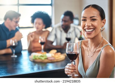 Social, Happy And Wine Of A Woman With A Glass Of Alcohol At A Dinner Table With Friends In A Restaurant. Young Female With Smile In Luxury Fun Dining With People At A Celebration Or Event Indoors.