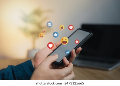 Social media and digital online concept, man using smart phone with Social media. The concept of living on vacation and playing social media. Social Distancing ,Working From Home concept. - Powered by Shutterstock