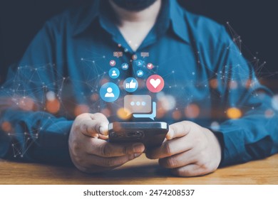 Social media and digital online concept, man using smart phone. The concept of living on vacation and playing social media. Social Distancing ,Working From Home concept. Social media concept. - Powered by Shutterstock