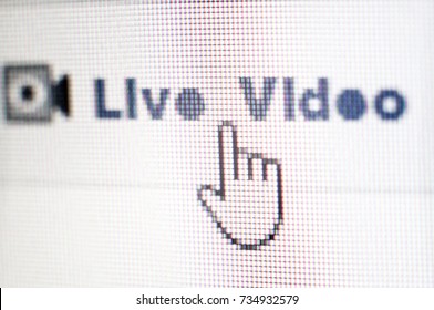 Social media macro photo of lcd screen. Live Video with hand cursor