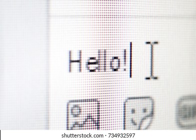 Social Media Macro Photo Of Lcd Screen. Hello Text With Type Cursor