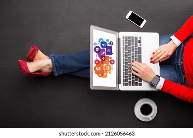Social Media Marketing Management  gestor Girl works in an office and does tasks online by using a laptop  