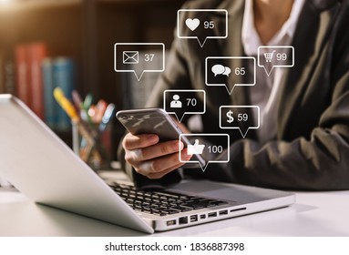 Social media and Marketing virtual icons screen concept.close up of businesswoman typing keyboard with  laptop computer 