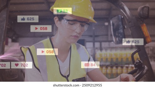 Social media notifications image over factory worker using handheld device. Industry, technology, smartphone, communication, labor, efficiency - Powered by Shutterstock