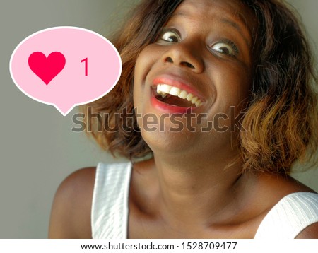 Social media obsession . young crazy happy and excited woman celebrating one single online like on internet  app in funny face expression on isolated background
