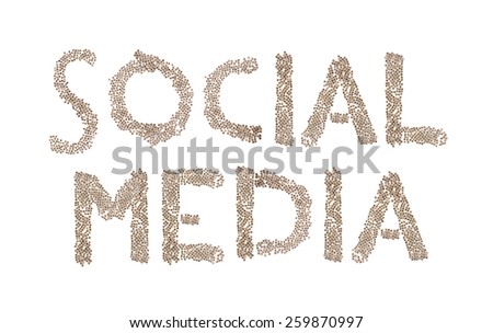 Social Media written in letters formed with wooden cubes with letters isolated on white background