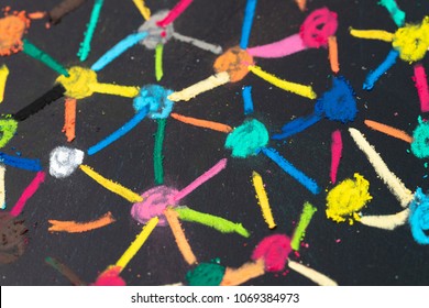 Social network or decentralize concept, macro view of colorful pastel link and connect chalk line between multiple dot or teer on blackboard.