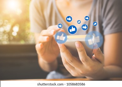 Social Network Sharing And Commenting In The Online Community, Woman Hand Holding Smartphone And Using Application Social Media