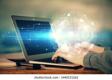 Social network theme hologram with businessman working on computer on background. Concept of world wide web. Multi exposure. - Shutterstock ID 1440151262