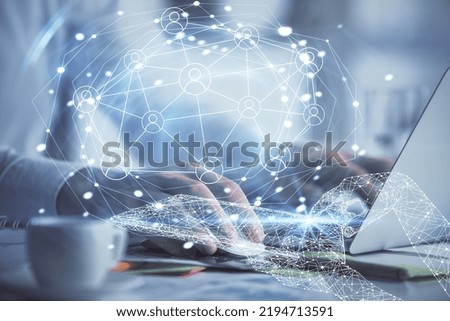 Social network theme hologram with businessman working on computer on background. Concept of world wide web. Double exposure.