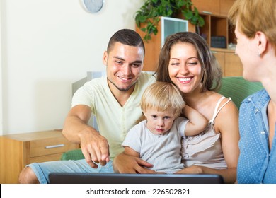 Social Worker To Explaining Something To A Young Family With Children