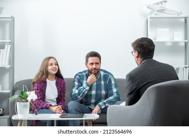 Social Worker Psychologist Talking To Father And Daughter Teenage. Parents Telling The Psychologist About Child Problems.