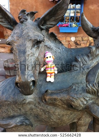 Sock Monkey with Donkey Statue