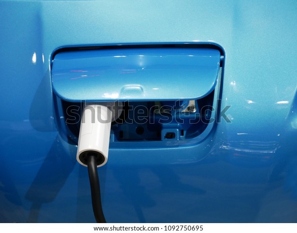 Socket for electrical car battery charger\
with load indicator lights, selective\
focus