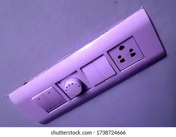 Socket with four switches anti parallel to each other and with connected ceiling fan adjustor