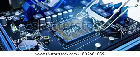 Socket for the motherboard with light Computer parts,Technological background.