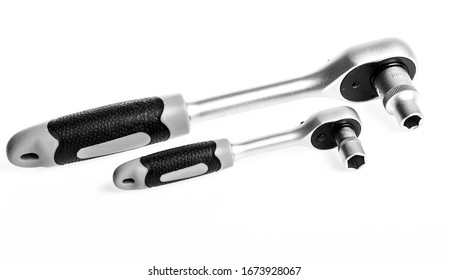Socket spanner wrenches white background. Knob for socket wrench nut ratchet close up. Ratchet tool. Ratchet wrench. Steel made with no skid threaded handle you can hold them firmly without slipping.
