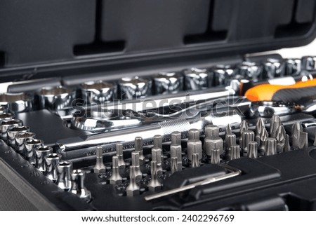 Socket wrench set in plastic case.
