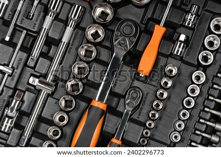 Socket wrench set in plastic case.